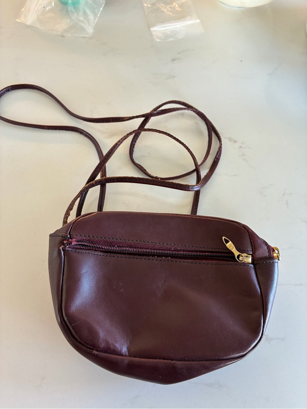 Vintage Handmade Maroon Leather Crossbody Bag  4 x 6, strap drop 28 in .